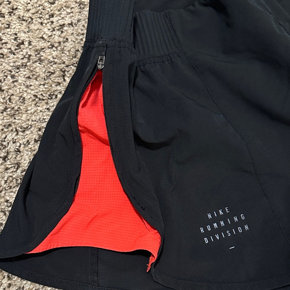 Nike Women's Black and Red Athletic Shorts with adjustable side zipper - Picture 2 of 2